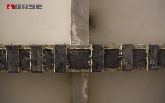 Reparação de concreto rachado com chapa de aço Reparação de concreto rachado com chapa de aço