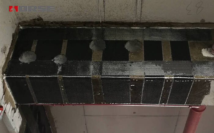 Concrete beams strengthening by CFRP composite strengthening system Concrete beams strengthening by CFRP composite strengthening system