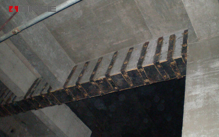 strengthened by sticking steel plates strengthened by sticking steel plates