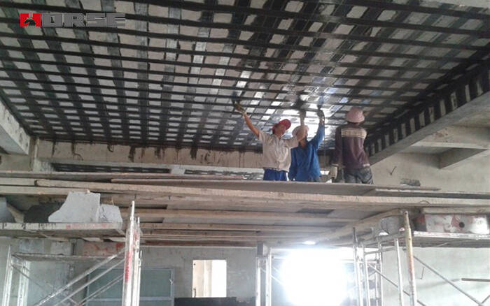 Carbon fiber fabric used in flexural reinforcement of slab Carbon fiber fabric used in flexural reinforcement of slab