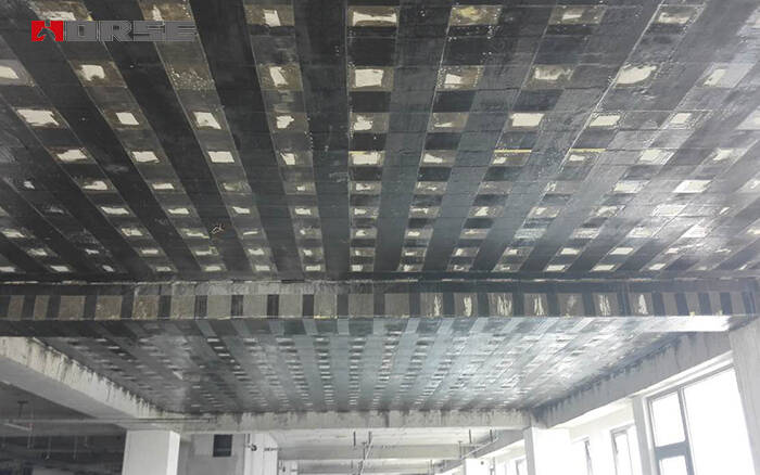 Carbon fiber reinforced polymer(CFRP) sheet reinforcement for floor slab Carbon fiber reinforced polymer(CFRP) sheet reinforcement for floor slab