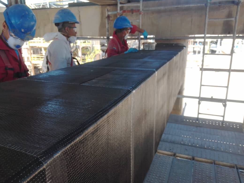 Reabilitação de Vigas de Betão Armado Danificadas com Tecido de Fibra de Carbono Unidirecional HM-30