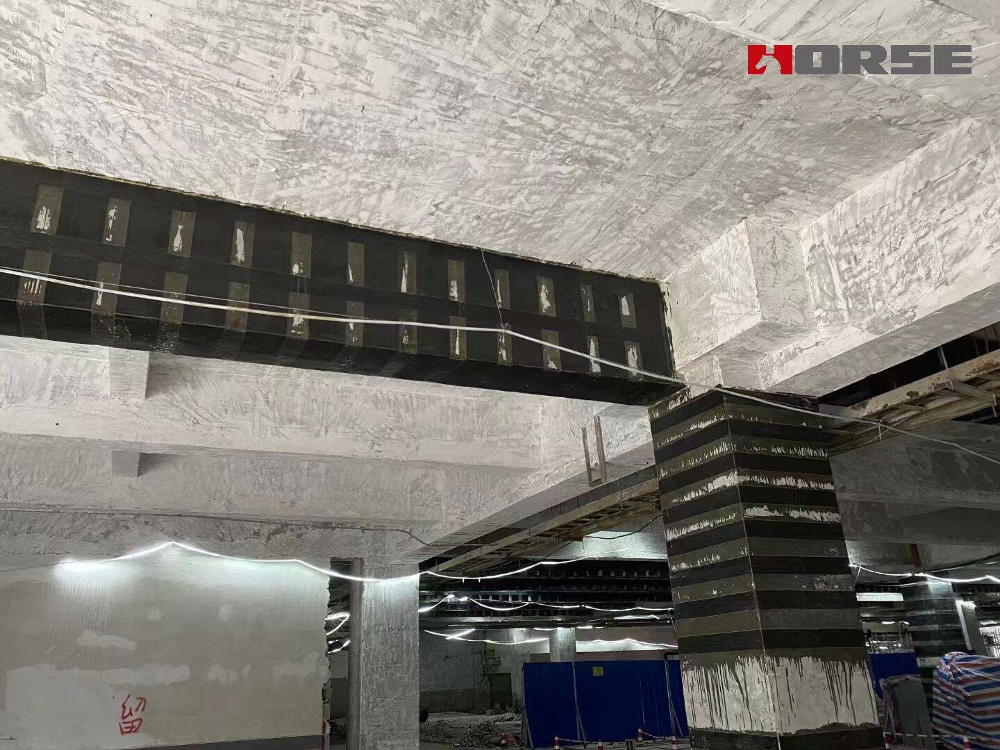 Compósitos de polímero reforçado com fibra de carbono (CFRP) para aumentar a capacidade do concreto armado