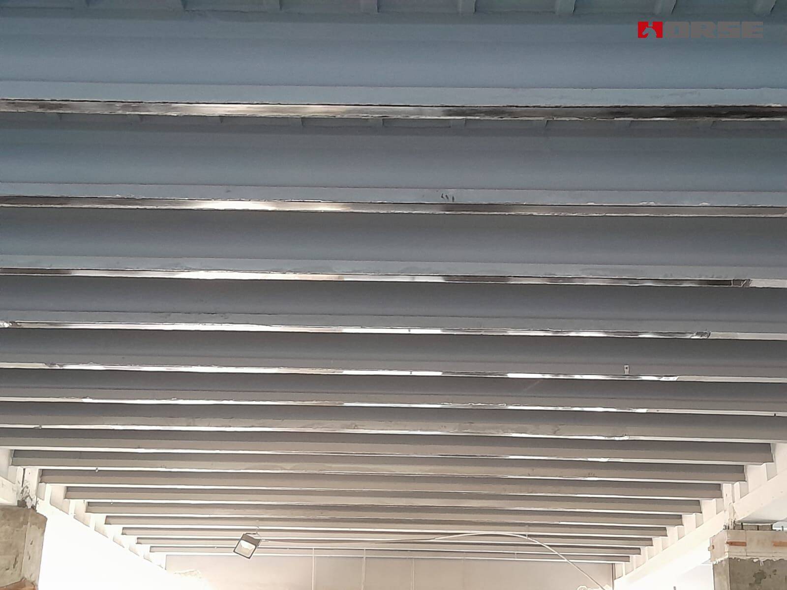 Laminado de fibra de carbono sobre vigas