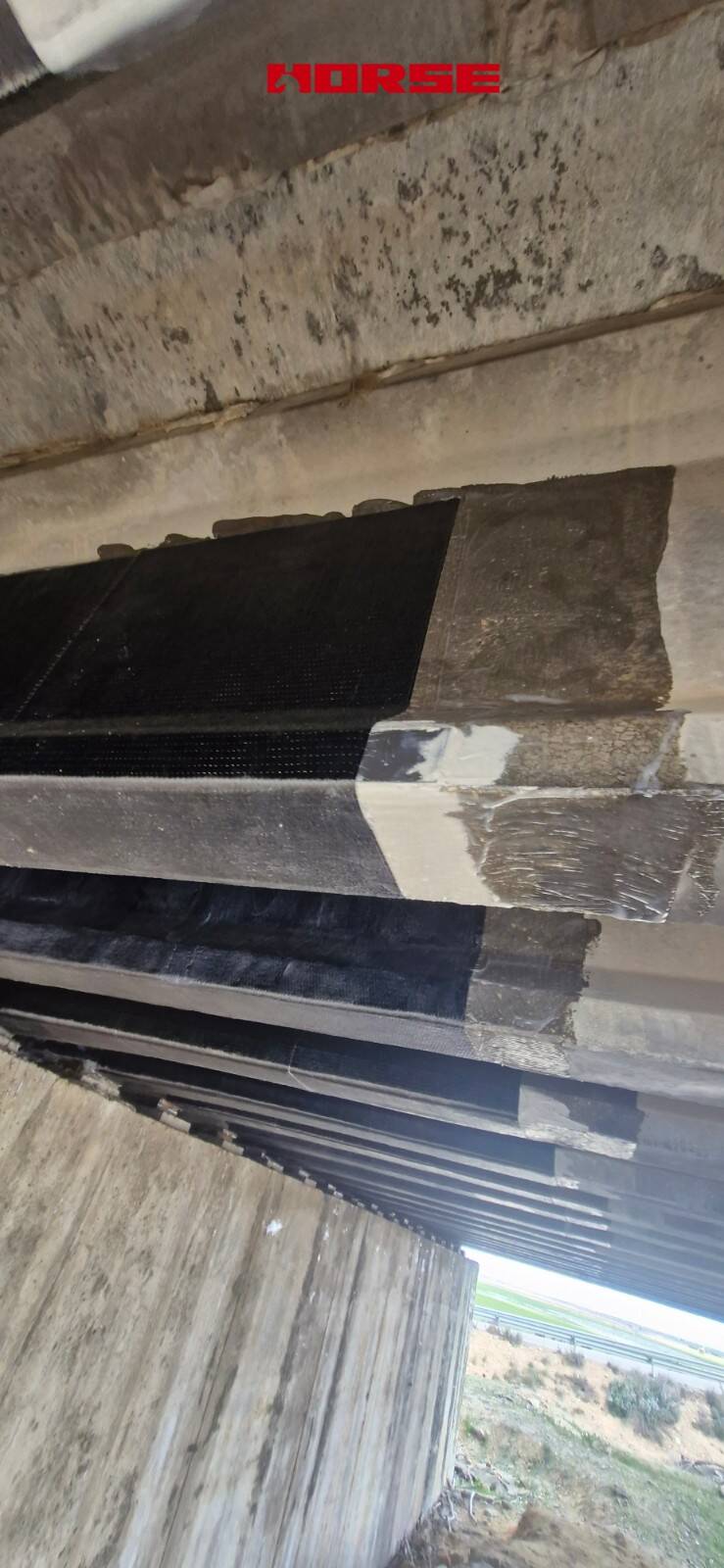 Reforço de Ponte Multiviga de Concreto Protendido com Laminado de CFRP e U-wrap Reforço de Ponte Multiviga de Concreto Protendido com Laminado de CFRP e U-wrap