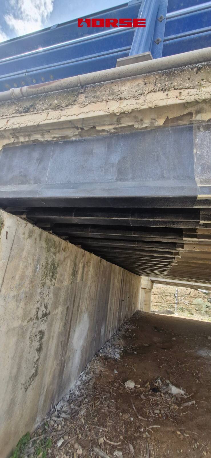 Reforço de Ponte Multiviga de Concreto Protendido com Laminado de CFRP e U-wrap Reforço de Ponte Multiviga de Concreto Protendido com Laminado de CFRP e U-wrap
