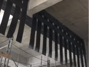 Vigas reforçadas com chapa de fibra de carbono - HORSE Construction