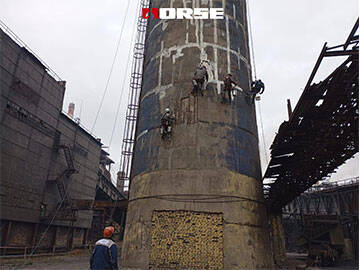 Reforço de fibra de carbono em chaminés com fissuras e vergalhões expostos